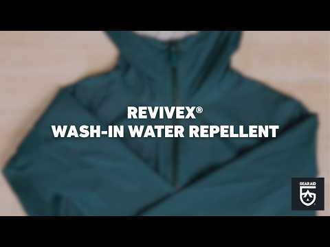 Blurred video cover showing a blue outdoor jacket laid flat on a surface, with the title “REVIVEX® WASH-IN WATER REPELLENT” centered and the Gear Aid logo in the bottom-right corner.