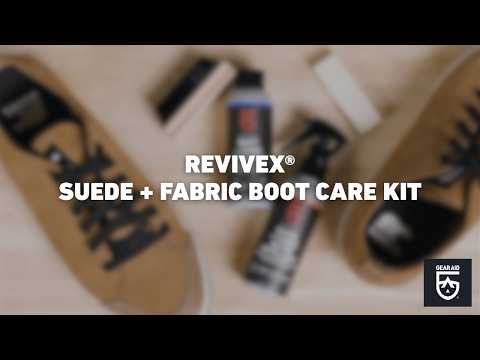 Blurred video cover showing suede shoes and boot-care products arranged on a tabletop, with the title “REVIVEX® SUEDE + FABRIC BOOT CARE KIT” centered and the Gear Aid logo in the bottom-right corner.