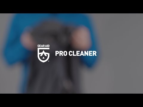 Blurred video cover showing someone holding up an insulated jacket, with the title “REVIVEX® PRO CLEANER” centered and the Gear Aid logo in the bottom-right corner.