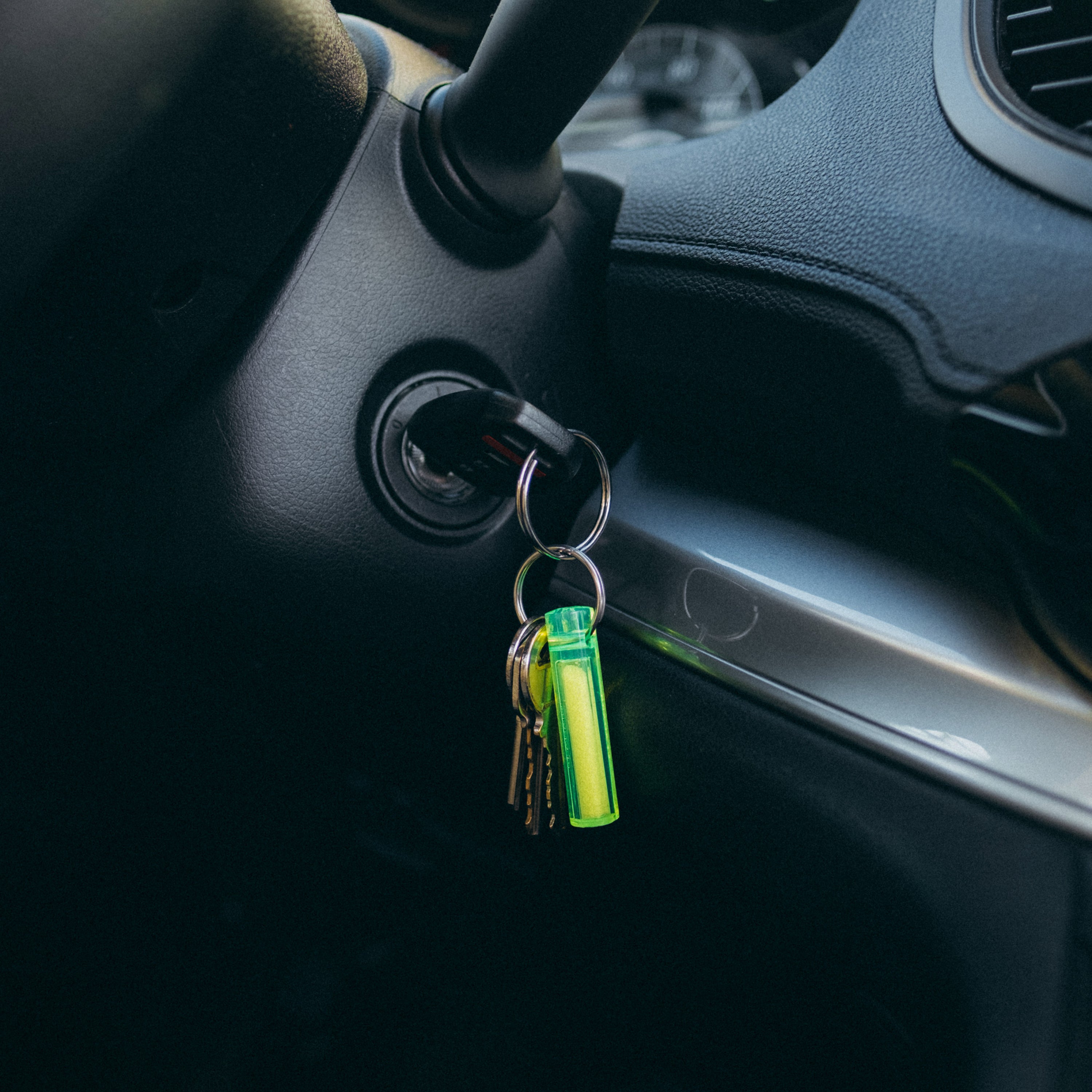 Ni Glo gear marker attached to a set of keys in the ignition of a car